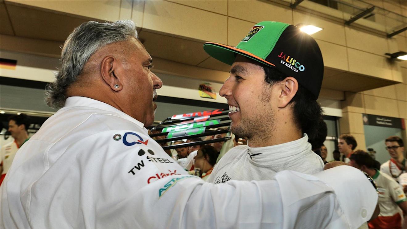 Sergio Perez (MEX) Force India celebrates Dr. Vijay Mallya (IND) Force India Formula One Team Owner. Formula One World Championship, Rd3, Bahrain Grand Prix, Race, Bahrain International Circuit, Sakhir, Bahrain, Sunday, 6 April 2014