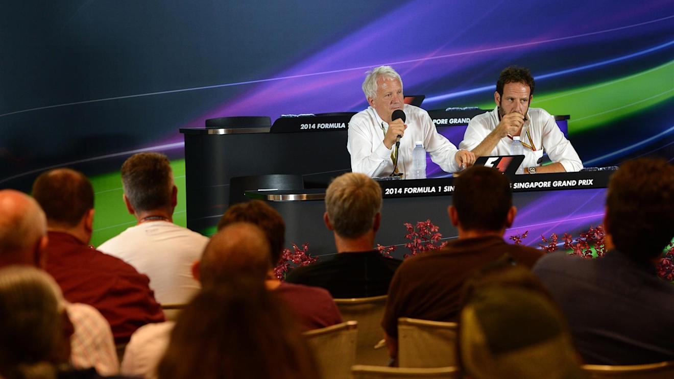(L to R): Charlie Whiting (GBR) FIA Delegate and Matteo Bonciani (ITA) FIA Media Delegate in a Press Conference. Formula One World Championship, Rd14, Singapore Grand Prix, Marina Bay Street Circuit, Singapore, Practice, Friday, 19 September 2014
