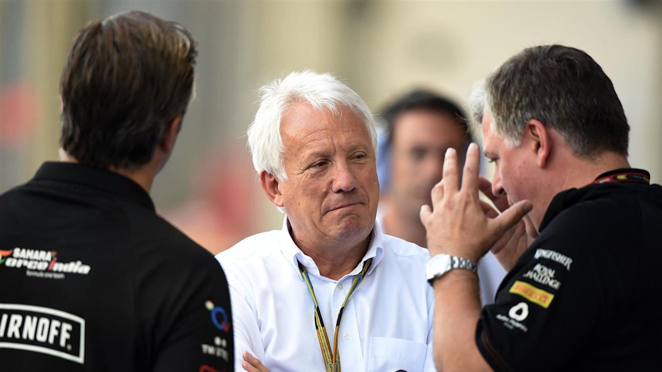 Charlie Whiting (GBR) FIA Delegate and Otmar Szafnauer (USA) Force India Formula One Team Chief Operating Officer. Formula One World Championship, Rd14, Singapore Grand Prix, Marina Bay Street Circuit, Singapore, Practice, Friday, 19 September 2014