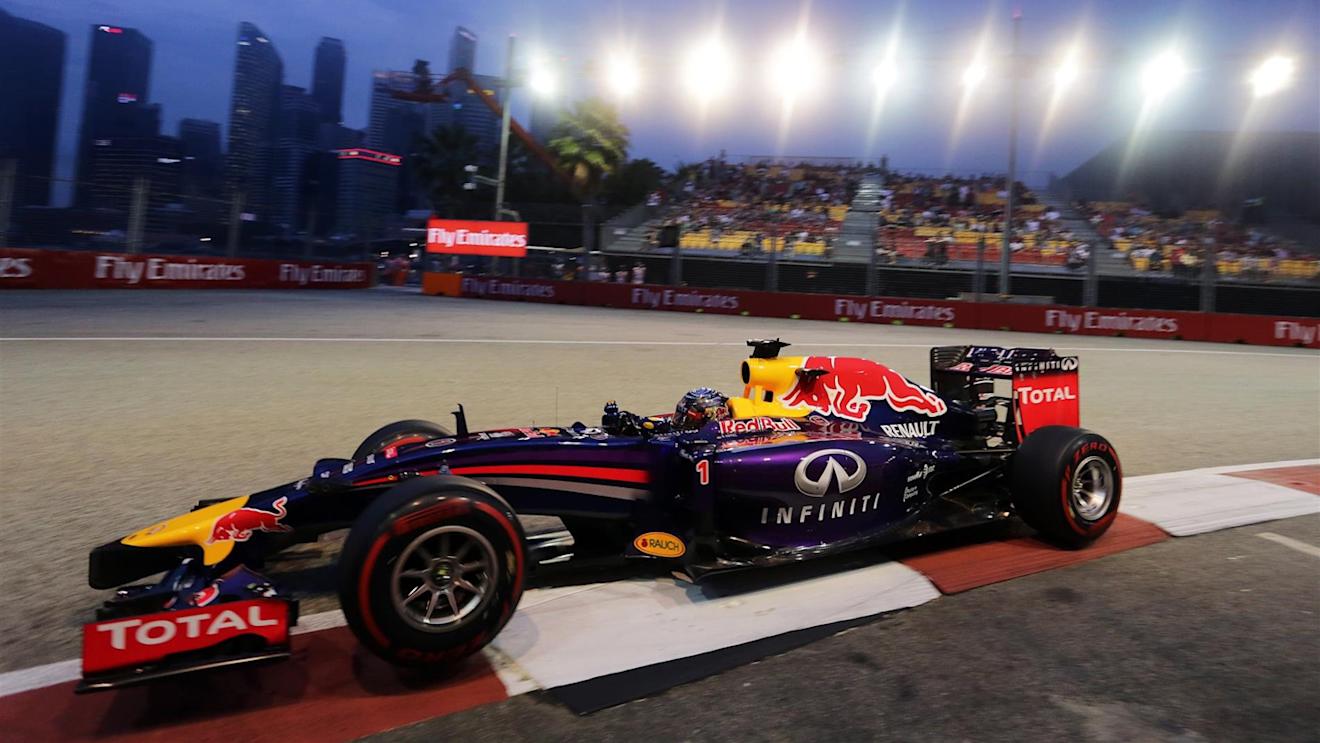 Sebastian Vettel (GER) Red Bull Racing RB10. Formula One World Championship, Rd14, Singapore Grand Prix, Marina Bay Street Circuit, Singapore, Qualifying, Saturday, 20 September 2014