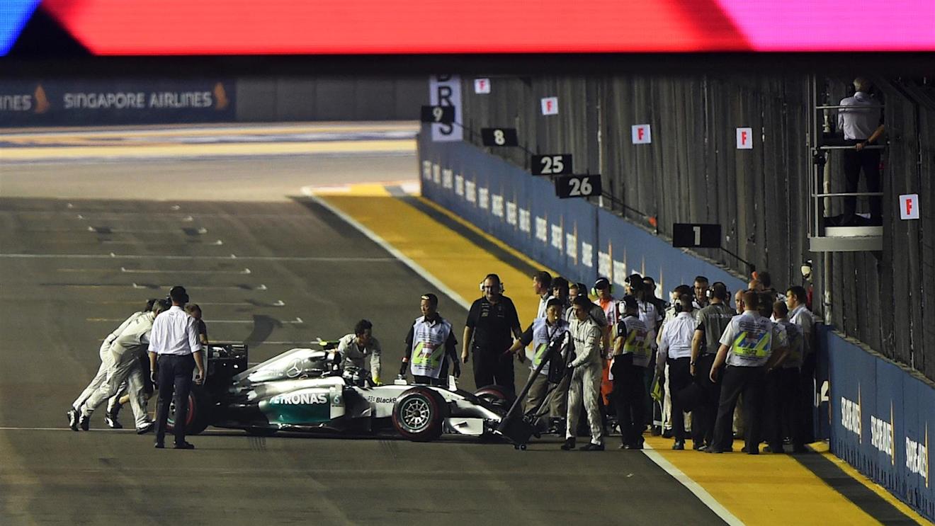 Nico Rosberg (GER) Mercedes AMG F1 W05 stalled on the grid. Formula One World Championship, Rd14, Singapore Grand Prix, Marina Bay Street Circuit, Singapore, Race Day, Sunday, 21 September 2014