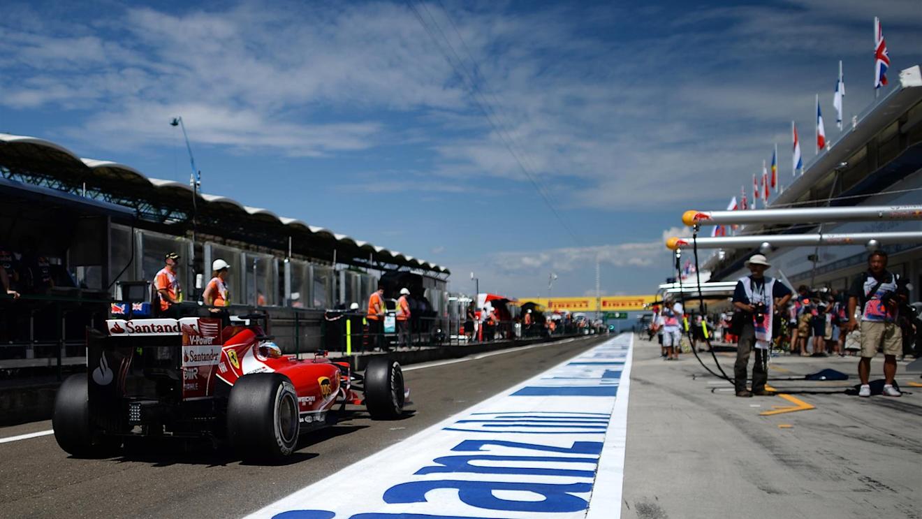Fernando Alonso (ESP) Ferrari F14 T in the pitlane. Formula One World Championship, Rd11, Hungarian Grand Prix, Practice, Hungaroring, Hungary. Friday, 25 July 2014