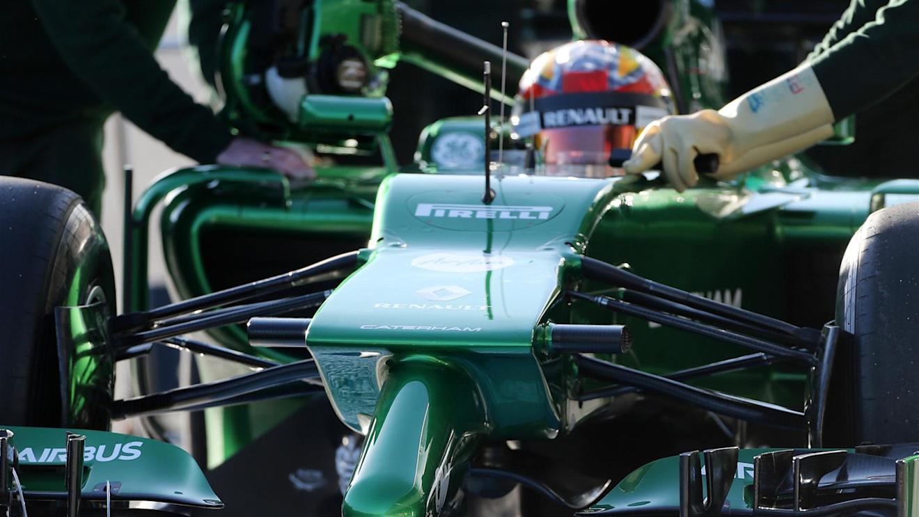 Robin Frijns (NDL) Caterham CT05 is pushed down pit lane by the Caterham mechanics. Formula One Testing, Jerez, Spain, Day Three, Thursday, 30 January 2014