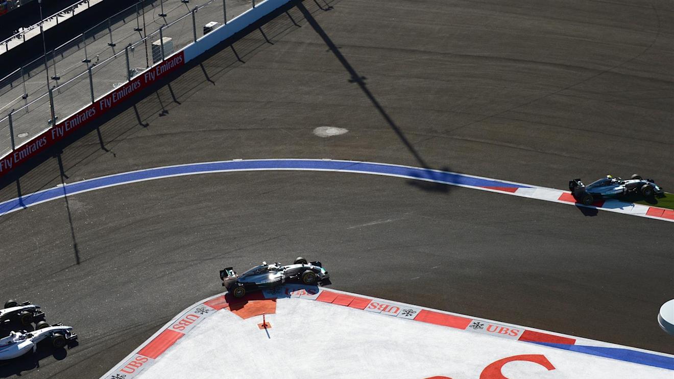 Nico Rosberg (GER) Mercedes AMG F1 W05 runs wide on lap one. Formula One World Championship, Rd16, Russian Grand Prix, Race, Sochi Autodrom, Sochi, Krasnodar Krai, Russia, Sunday, 12 October 2014