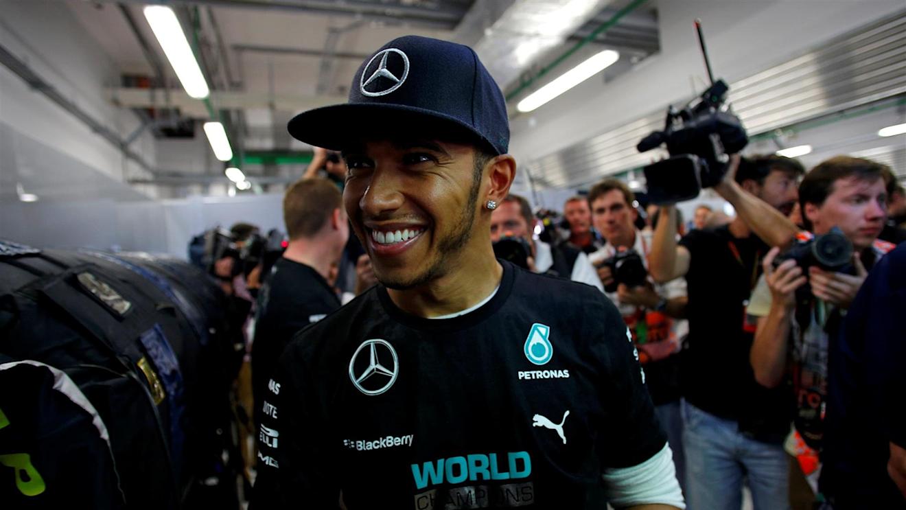 Race winner Lewis Hamilton (GBR) Mercedes AMG F1 celebrates. Formula One World Championship, Rd16, Russian Grand Prix, Race, Sochi Autodrom, Sochi, Krasnodar Krai, Russia, Sunday, 12 October 2014