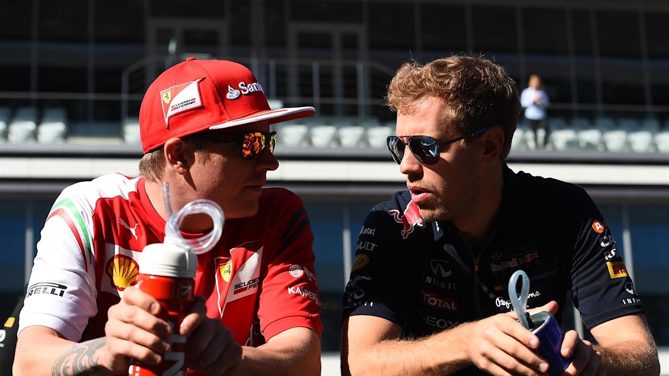 (L to R): Kimi Raikkonen (FIN) Ferrari and Sebastian Vettel (GER) Red Bull Racing on the drivers parade. Formula One World Championship, Rd16, Russian Grand Prix, Race, Sochi Autodrom, Sochi, Krasnodar Krai, Russia, Sunday, 12 October 2014