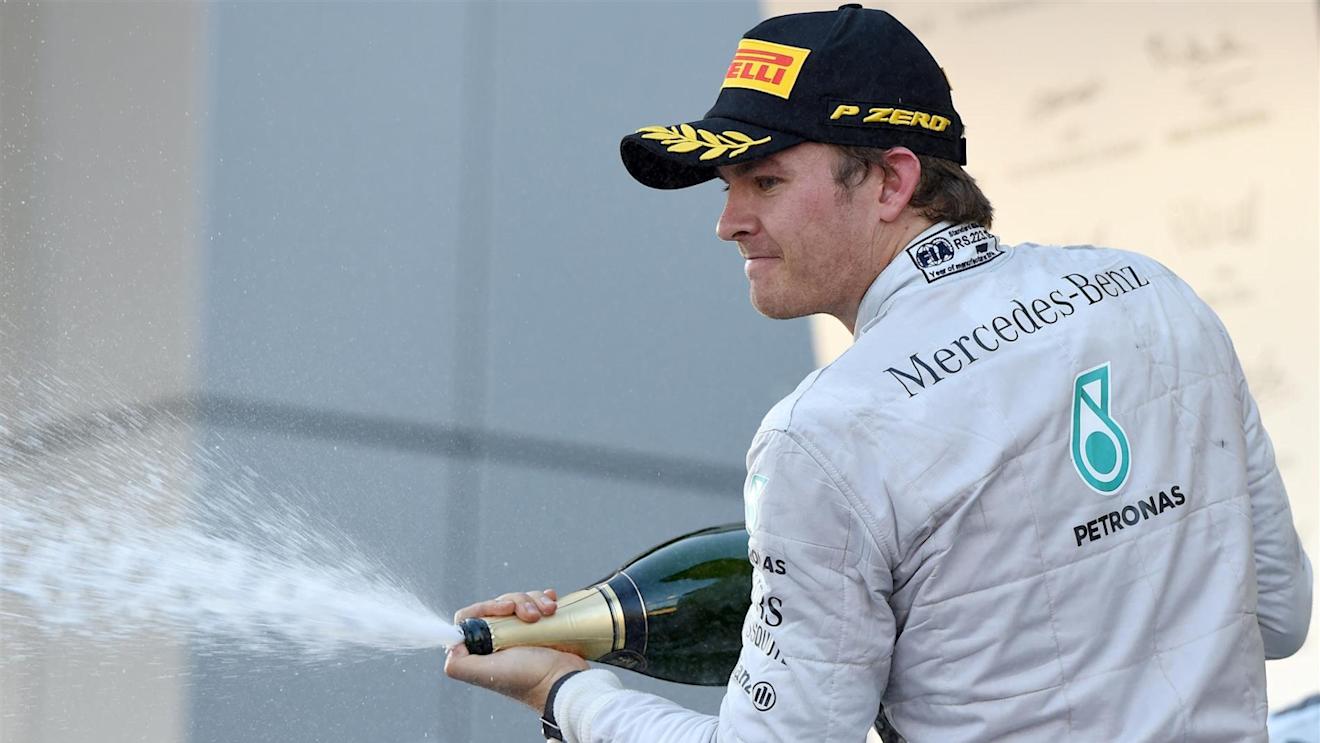 Nico Rosberg (GER) Mercedes AMG F1 celebrates on the podium with the champagne. Formula One World Championship, Rd16, Russian Grand Prix, Race, Sochi Autodrom, Sochi, Krasnodar Krai, Russia, Sunday, 12 October 2014