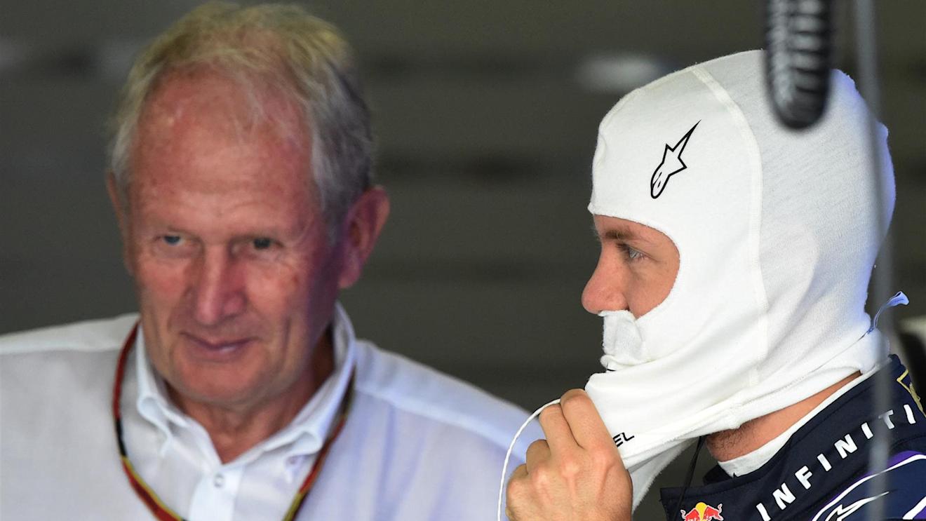 Dr Helmut Marko (AUT) Red Bull Motorsport Consultant and Sebastian Vettel (GER) Red Bull Racing. Formula One World Championship, Rd15, Japanese Grand Prix, Qualifying, Suzuka, Japan, Saturday, 4 October 2014