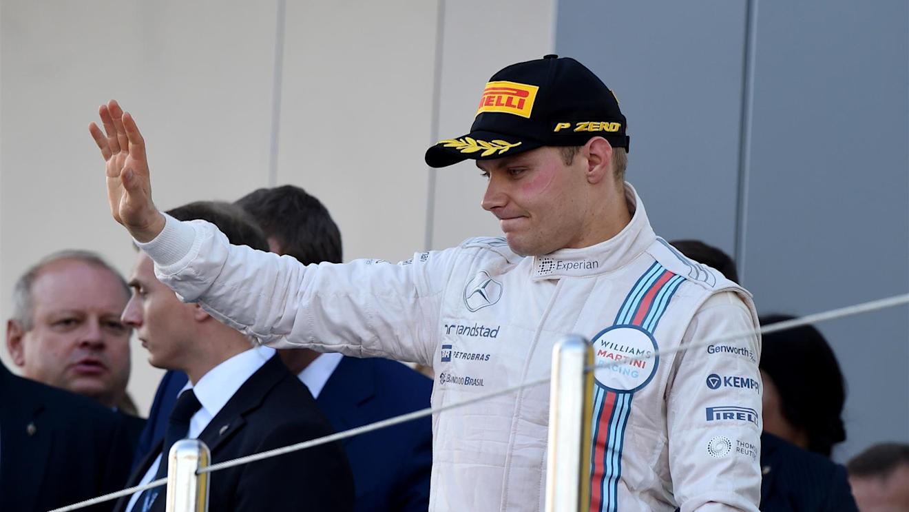 Third placed Valtteri Bottas (FIN) Williams Martini Racing on the podium. Formula One World Championship, Rd16, Russian Grand Prix, Race, Sochi Autodrom, Sochi, Krasnodar Krai, Russia, Sunday, 12 October 2014