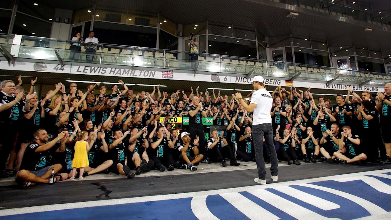 Nico Rosberg (GER) Mercedes AMG F1 celebrates with the team. Formula One World Championship, Rd19, Abu Dhabi Grand Prix, Race, Yas Marina Circuit, Abu Dhabi, UAE, Sunday, 23 November 2014