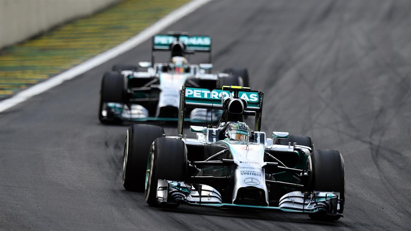 Nico Rosberg (GER) Mercedes AMG F1 W05 leads Lewis Hamilton (GBR) Mercedes AMG F1 W05. Formula One World Championship, Rd18, Brazilian Grand Prix, Race, Sao Paulo, Brazil, Sunday, 9 November 2014
