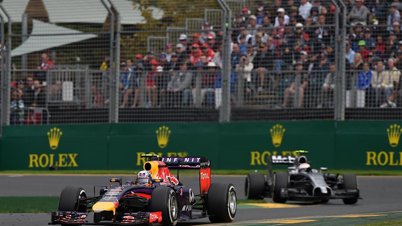 Daniel Ricciardo (AUS) Red Bull Racing RB10 and Kevin Magnussen (DEN) McLaren MP4-29. Formula One World Championship, Rd1, Australian Grand Prix, Race, Albert Park, Melbourne, Australia, Sunday, 16 March 2014