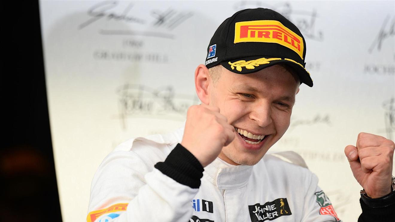 Kevin Magnussen (DEN) McLaren celebrates third place on the podium. Formula One World Championship, Rd1, Australian Grand Prix, Race, Albert Park, Melbourne, Australia, Sunday, 16 March 2014