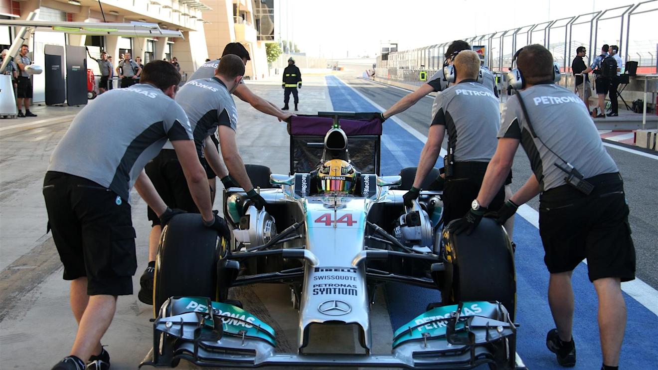Lewis Hamilton (GBR) Mercedes AMG F1 W05 is pushed along pit lane. Formula One Testing, Day Four, Bahrain International Circuit, Sakhir, Bahrain, Sunday, 2 March 2014