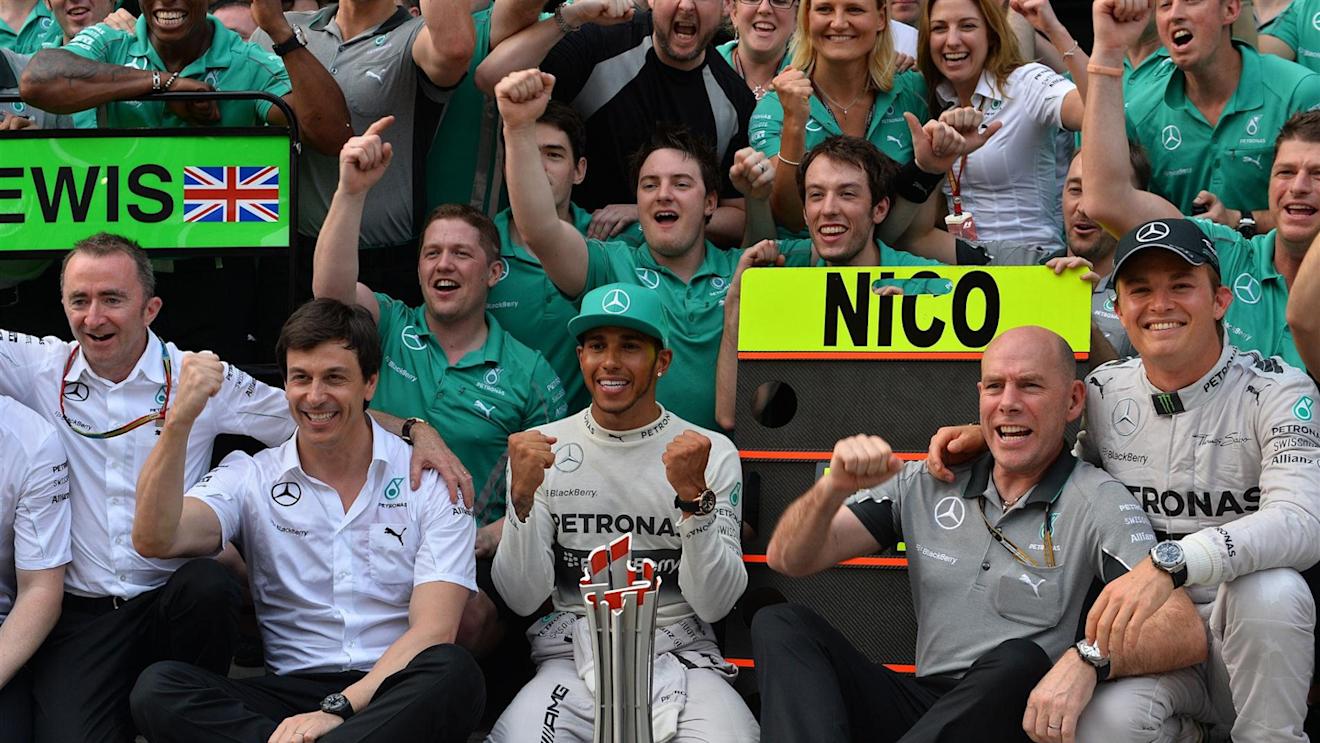 Lewis Hamilton (GBR) Mercedes AMG F1 and Nico Rosberg (GER) Mercedes AMG F1 celebrate with the team. Formula One World Championship, Rd2, Malaysian Grand Prix, Race, Sepang, Malaysia, Sunday, 30 March 2014