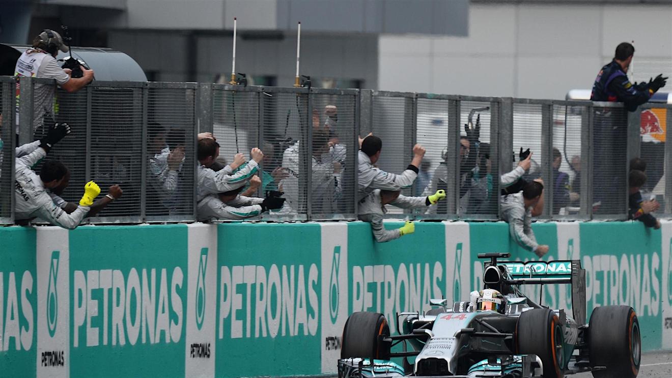 Race winner Lewis Hamilton (GBR) Mercedes AMG F1 W05 crosses the line. Formula One World Championship, Rd2, Malaysian Grand Prix, Race, Sepang, Malaysia, Sunday, 30 March 2014