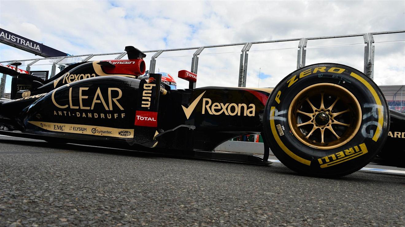 Romain Grosjean (FRA) Lotus E22 waits to leave the pit lane for the grid. Formula One World Championship, Rd1, Australian Grand Prix, Race, Albert Park, Melbourne, Australia, Sunday, 16 March 2014