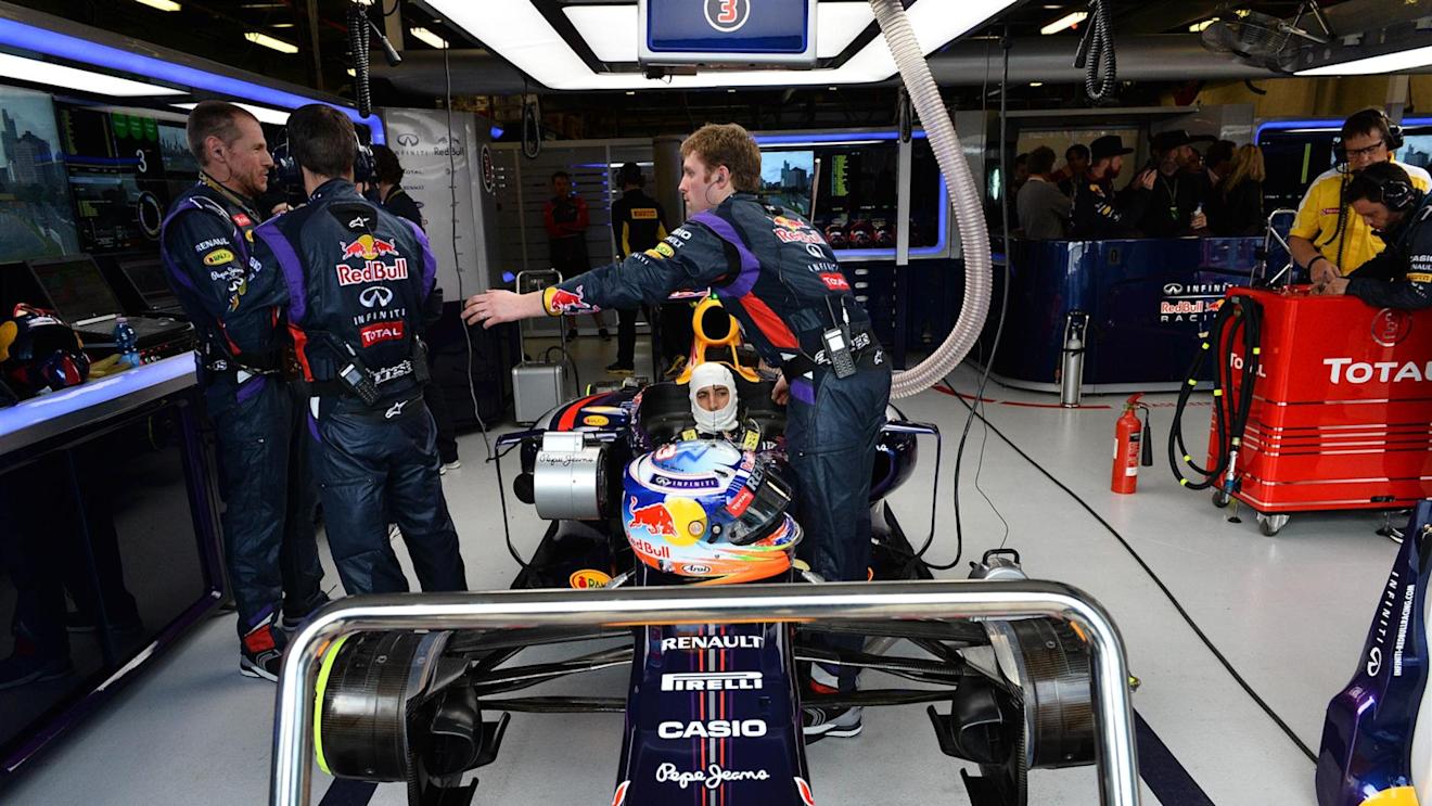Daniel Ricciardo (AUS) Red Bull Racing RB10 in his pit garage. Formula One World Championship, Rd1, Australian Grand Prix, Race, Albert Park, Melbourne, Australia, Sunday, 16 March 2014