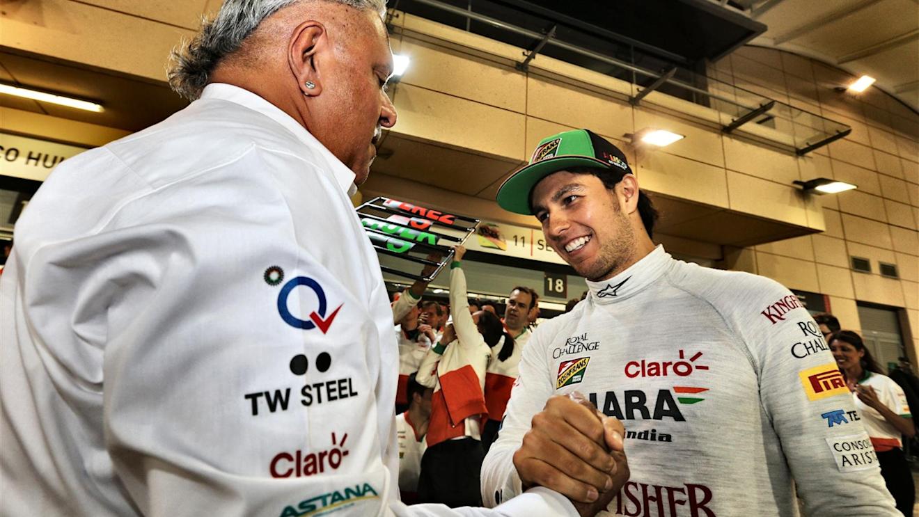 Sergio Perez (MEX) Force India celebrates Dr. Vijay Mallya (IND) Force India Formula One Team Owner. Formula One World Championship, Rd3, Bahrain Grand Prix, Race, Bahrain International Circuit, Sakhir, Bahrain, Sunday, 6 April 2014