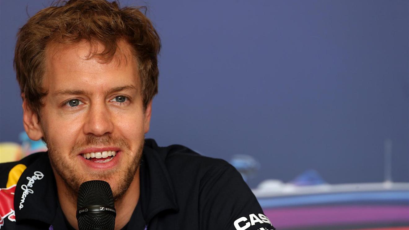 Sebastian Vettel (GER) Red Bull Racing. Formula One World Championship, Rd3, Bahrain Grand Prix, Preparations, Bahrain International Circuit, Sakhir, Bahrain, Thursday, 3 April 2014