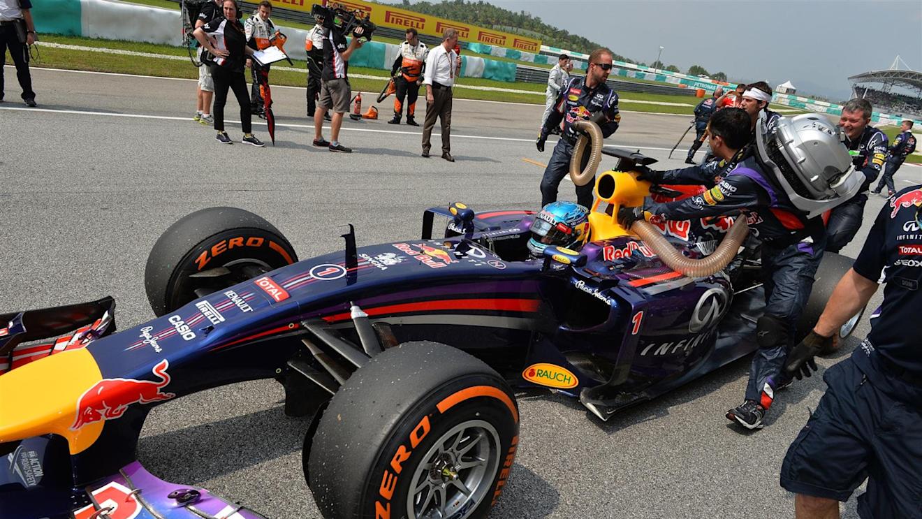Sebastian Vettel (GER) Red Bull Racing RB10 on the grid. Formula One World Championship, Rd2, Malaysian Grand Prix, Race, Sepang, Malaysia, Sunday, 30 March 2014