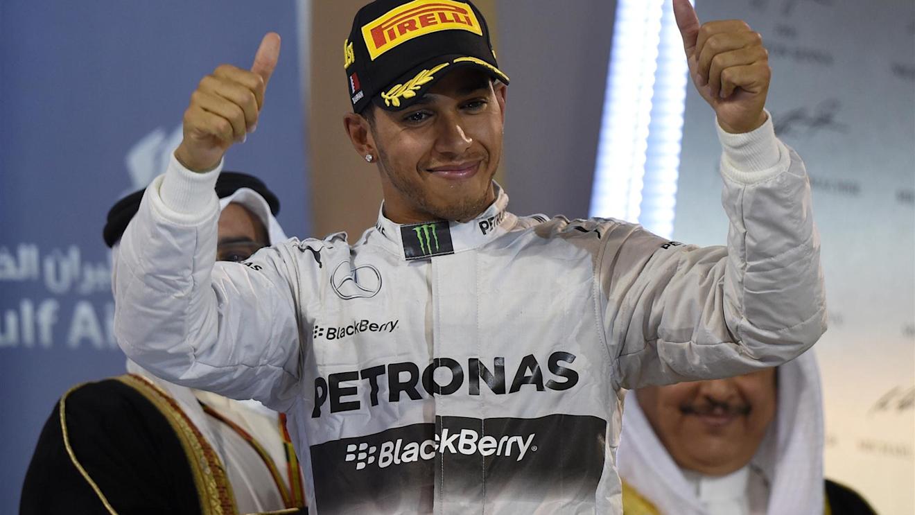 Race winner Lewis Hamilton (GBR) Mercedes AMG F1 celebrates on the podium. Formula One World Championship, Rd3, Bahrain Grand Prix, Race, Bahrain International Circuit, Sakhir, Bahrain, Sunday, 6 April 2014