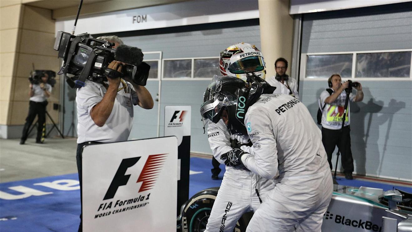 Race winner Lewis Hamilton (GBR) Mercedes AMG F1 celebrates in parc ferme with Nico Rosberg (GER) Mercedes AMG F1. Formula One World Championship, Rd3, Bahrain Grand Prix, Race, Bahrain International Circuit, Sakhir, Bahrain, Sunday, 6 April 2014