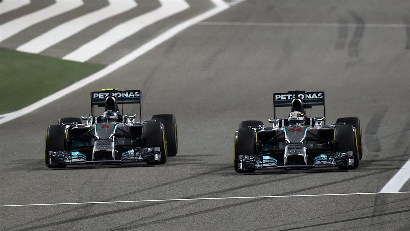Lewis Hamilton (GBR) Mercedes AMG F1 W05 and Nico Rosberg (GER) Mercedes AMG F1 W05 battle. Formula One World Championship, Rd3, Bahrain Grand Prix, Race, Bahrain International Circuit, Sakhir, Bahrain, Sunday, 6 April 2014