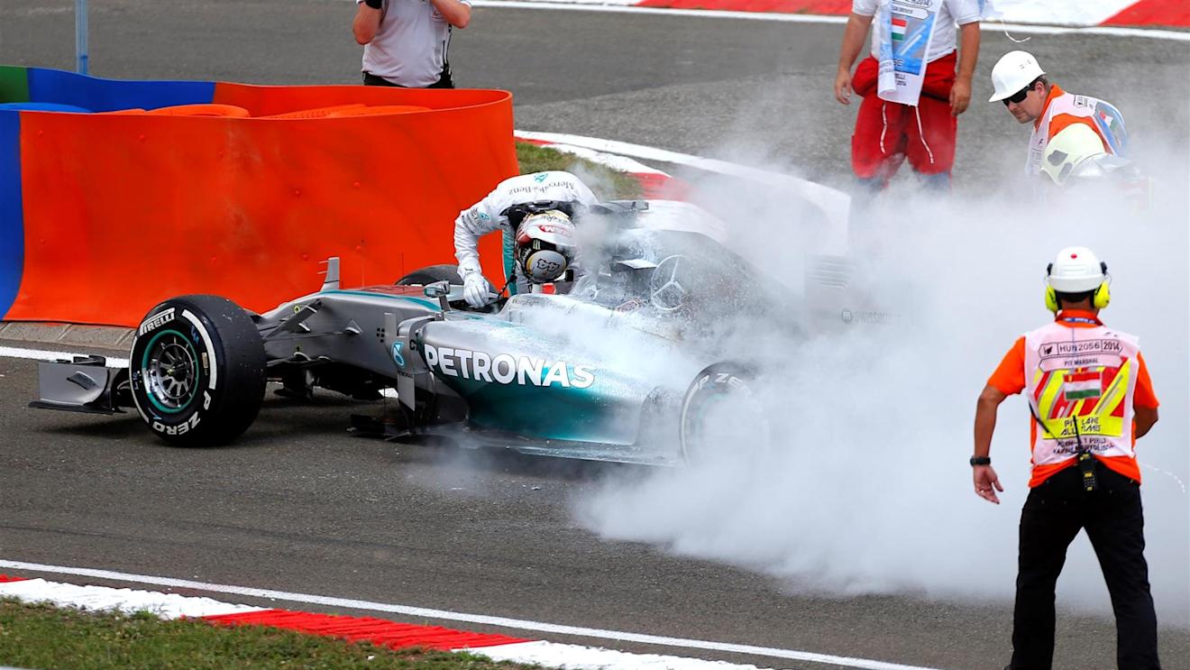 Lewis Hamilton (GBR) Mercedes AMG F1 W05 with a fire in Q1. Formula One World Championship, Rd11, Hungarian Grand Prix, Qualifying, Hungaroring, Hungary. Saturday, 26 July 2014