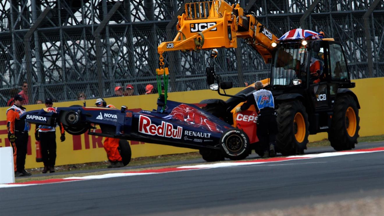 The car of Jean-Eric Vergne (FRA) Scuderia Toro Rosso STR9 is recovered in FP2. Formula One World Championship, Rd9, British Grand Prix, Practice, Silverstone, England, Friday, 4 July 2014