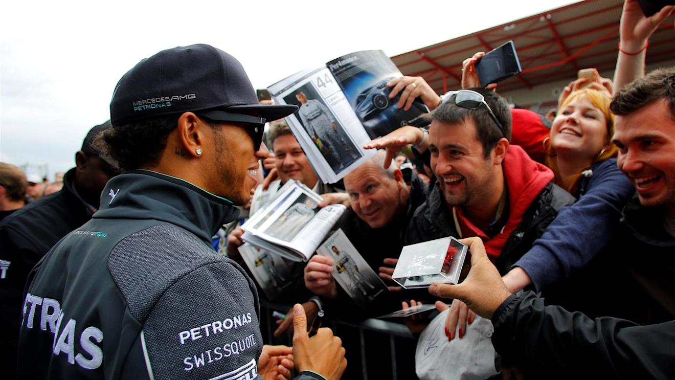 Lewis Hamilton (GBR) Mercedes AMG F1 signs autographs for the fans. Formula One World Championship, Rd12, Belgian Grand Prix, Preparations, Spa-Francorchamps, Belgium, Thursday, 21 August 2014