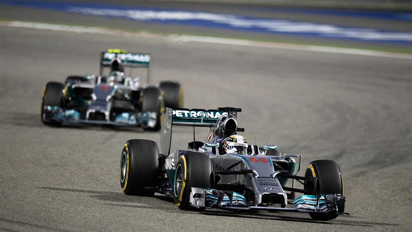 Lewis Hamilton (GBR) Mercedes AMG F1 W05 leads Nico Rosberg (GER) Mercedes AMG F1 W05. Formula One World Championship, Rd3, Bahrain Grand Prix, Race, Bahrain International Circuit, Sakhir, Bahrain, Sunday, 6 April 2014