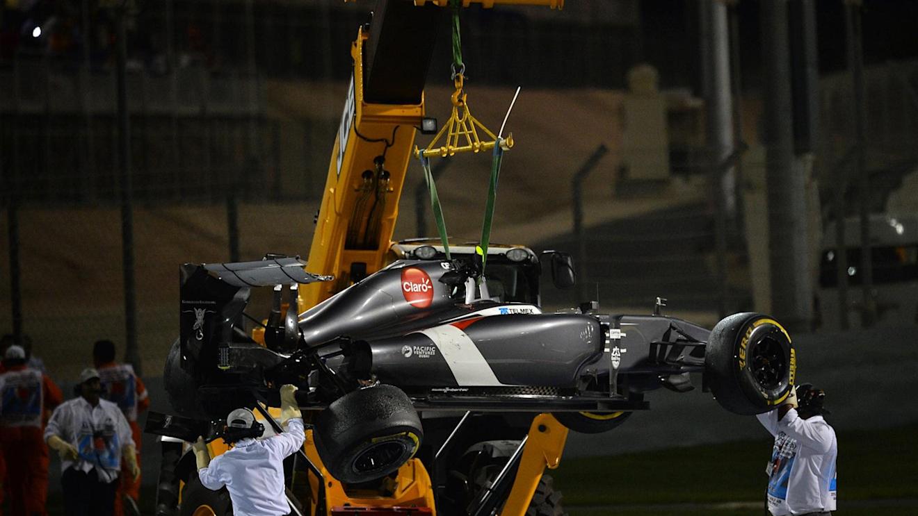 The car of Esteban Gutierrez (MEX) Sauber C33 is recovered after rolling. Formula One World Championship, Rd3, Bahrain Grand Prix, Race, Bahrain International Circuit, Sakhir, Bahrain, Sunday, 6 April 2014