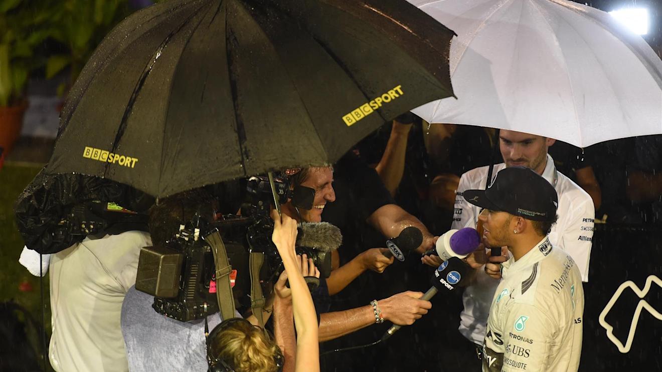Pole sitter Lewis Hamilton (GBR) Mercedes AMG F1 talks with the media. Formula One World Championship, Rd14, Singapore Grand Prix, Marina Bay Street Circuit, Singapore, Qualifying, Saturday, 20 September 2014