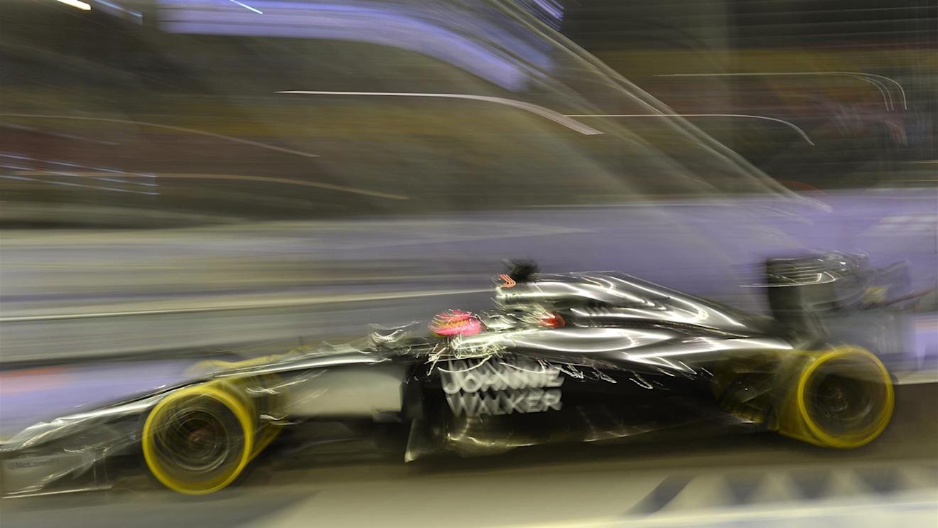 Jenson Button (GBR) McLaren MP4-29. Formula One World Championship, Rd14, Singapore Grand Prix, Marina Bay Street Circuit, Singapore, Practice, Friday, 19 September 2014