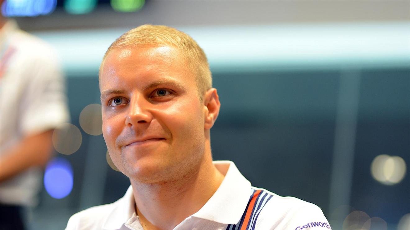 Valtteri Bottas (FIN) Williams Martini Racing in the autograph session. Formula One World Championship, Rd14, Singapore Grand Prix, Marina Bay Street Circuit, Singapore, Preparations, Thursday, 18 September 2014