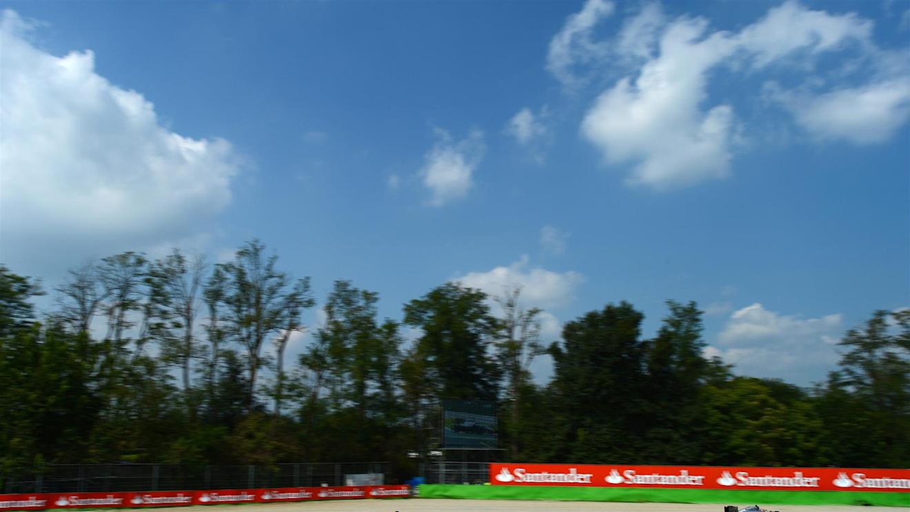 Kevin Magnussen (DEN) McLaren MP4-29 leads Sebastian Vettel (GER) Red Bull Racing RB10 and Valtteri Bottas (FIN) Williams FW36. Formula One World Championship, Rd13, Italian Grand Prix, Monza, Italy, Race Day, Sunday, 7 September 2014