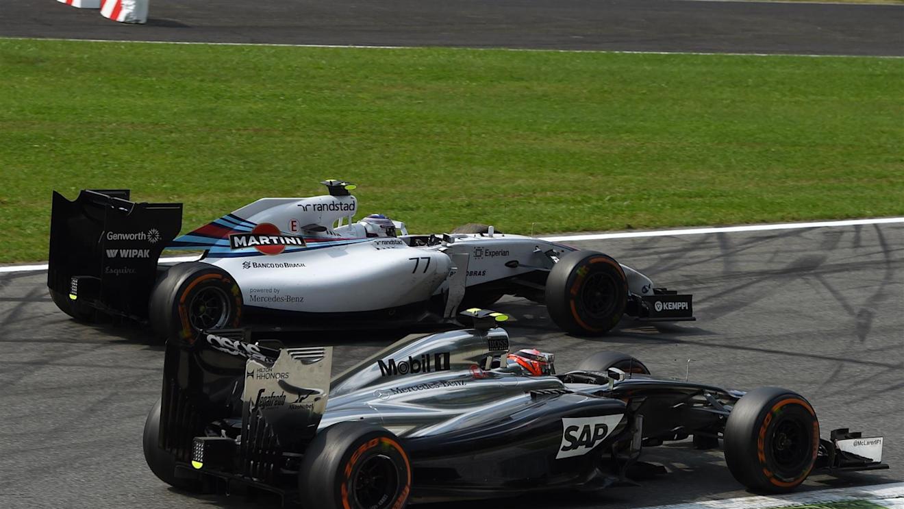 Valtteri Bottas (FIN) Williams FW36 and Kevin Magnussen (DEN) McLaren MP4-29 battle. Formula One World Championship, Rd13, Italian Grand Prix, Monza, Italy, Race Day, Sunday, 7 September 2014