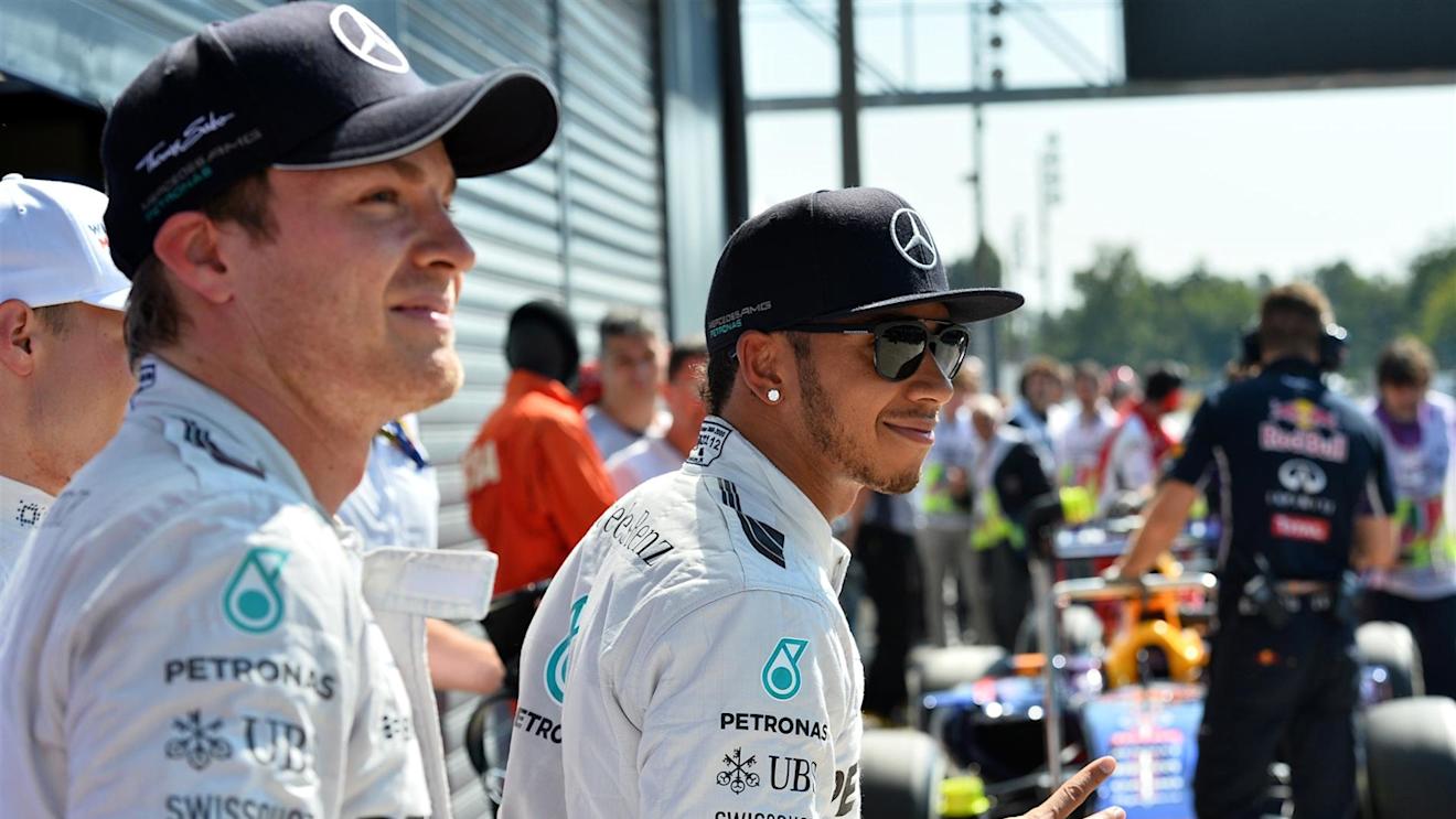 Pole sitter Lewis Hamilton (GBR) Mercedes AMG F1 and Nico Rosberg (GER) Mercedes AMG F1 celebrate in parc ferme. Formula One World Championship, Rd13, Italian Grand Prix, Monza, Italy, Qualifying, Saturday, 6 September 2014