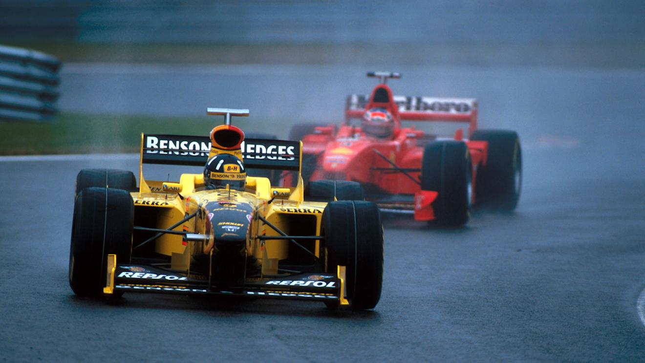 Race winner Damon Hill (GBR) Jordan 198 holds off Michael Schumacher (GER) Ferrari F300 early in the race.  
Formula One World Championship, Rd 13, Belgian Grand Prix, Spa Francorchamps, Belgium, 30 August 1998
