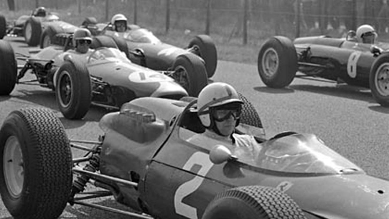 Zandvoort, May 1964: John Surtees on the grid for the Dutch Grand Prix. Second place in the race gave him his first points of the season and set him on his way to the 1964 world championship. © Schlegelmilch © No reproduction without permission.