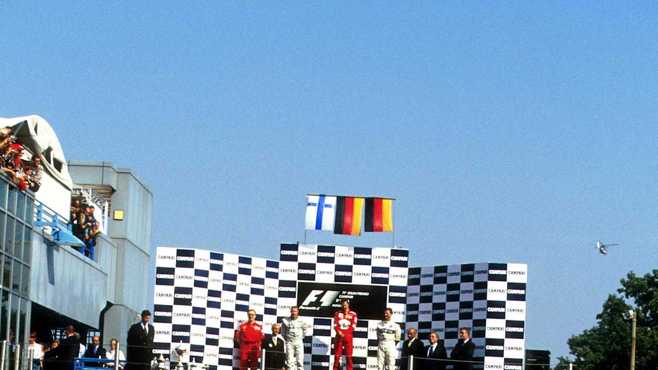 The Tifosi go crazy at Michael Schumacher(GER) Ferrari F1 2000 on the podium
Italian GP, Monza, 10 September 2000