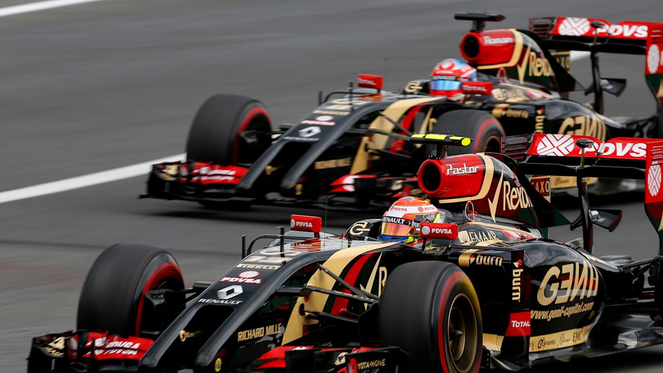 Pastor Maldonado (VEN) Lotus E22 and Romain Grosjean (FRA) Lotus E22. Formula One World Championship, Rd8, Austrian Grand Prix, Practice, Spielberg, Austria, Friday 20 June 2014. © Sutton Motorsport Images