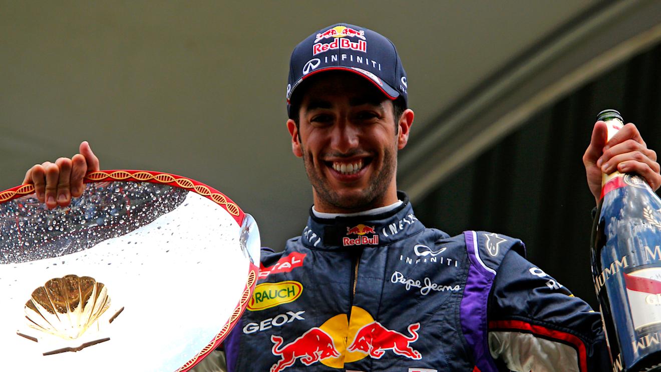 Race winner Daniel Ricciardo (AUS) Red Bull Racing with his trophy and champagne on the podium. Formula One World Championship, Rd12, Belgian Grand Prix, Race Day, Spa-Francorchamps, Belgium, Sunday 24 August 2014. © Sutton Motorsport Images