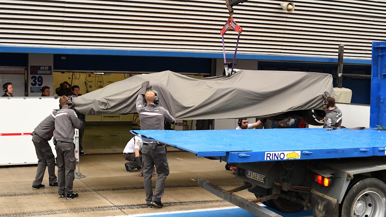 The Sauber C33 of Adrian Sutil (GER) is returned to the pit lane on a transporter after he span backwards into the gravel at the final chicane. Formula One Testing, Jerez, Spain, Day Four, Friday, 31 January 2014 © Sutton Images. No reproduction without permission