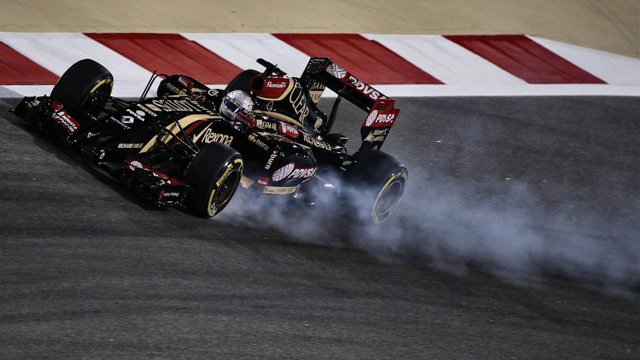 Romain Grosjean (FRA) Lotus E22 locks up. Formula One World Championship, Rd3, Bahrain Grand Prix, Practice, Bahrain International Circuit, Sakhir, Bahrain, Friday, 4 April 2014