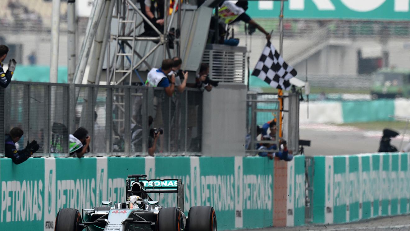 Race winner Lewis Hamilton (GBR) Mercedes AMG F1 W05 takes the chequered flag.
Formula One World Championship, Rd2, Malaysian Grand Prix, Race, Sepang, Malaysia, Sunday 30 March 2014. © Sutton Images