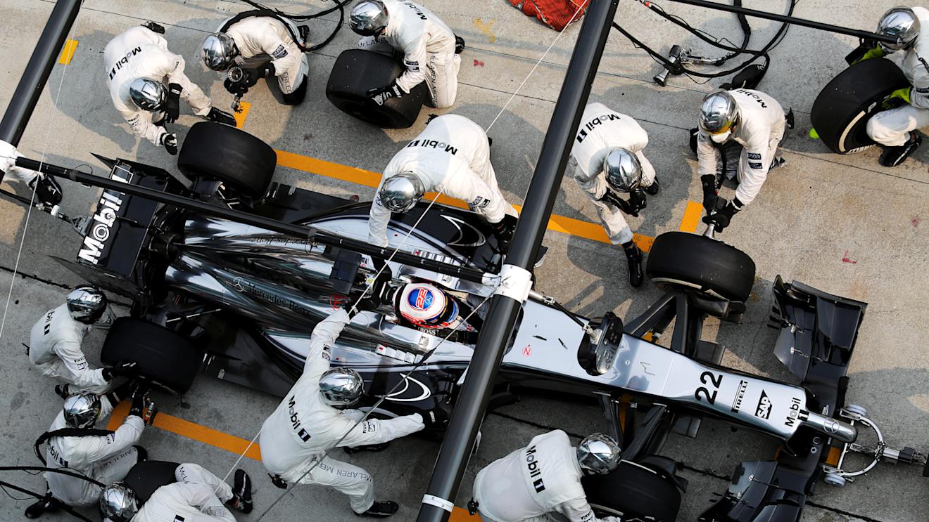 Jenson Button (GBR) McLaren MP4-29 makes a pit stop. Formula One World Championship, Rd2, Malaysian Grand Prix, Race, Sepang, Malaysia, Sunday, 30 March 2014. © Sutton Images