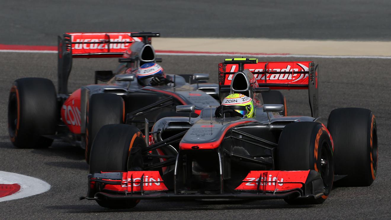 Sergio Perez (MEX) McLaren MP4-28 and Jenson Button (GBR) McLaren MP4-28.
Formula One World Championship, Rd4, Bahrain Grand Prix, Race Day, Bahrain International Circuit, Sakhir, Bahrain, Sunday 21 April 2013. © Sutton Motorsport Images