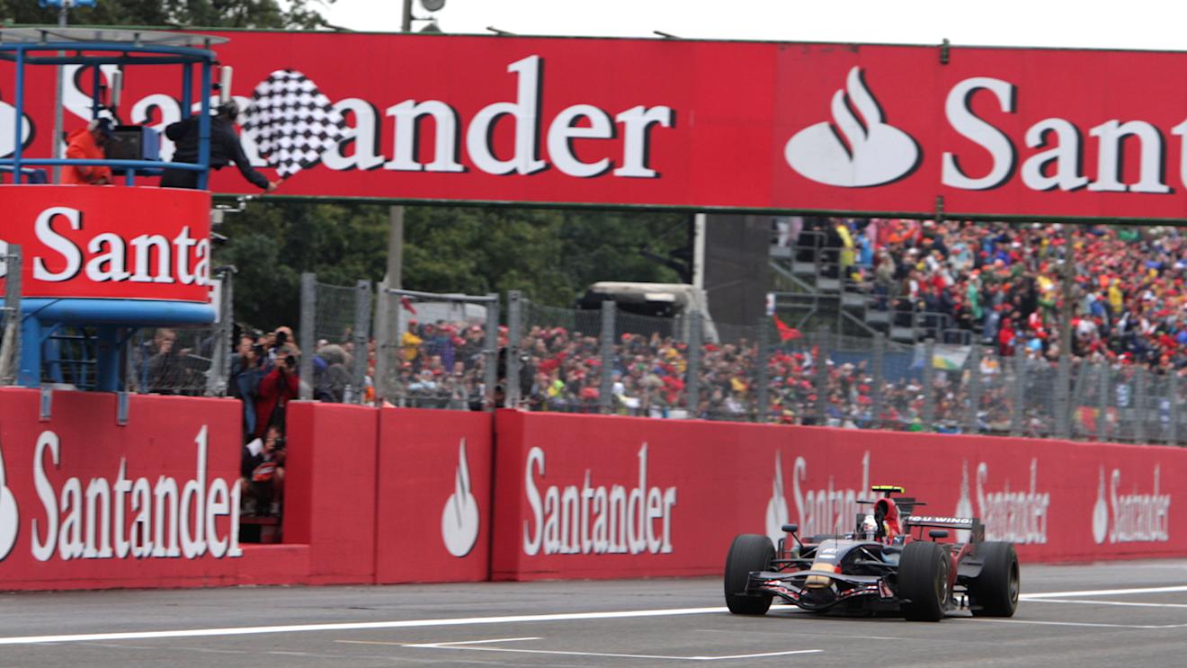 Sebastian Vettel (GER) Scuderia Toro Rosso STR03 passes the chequered flag to win
Formula One World Championship, Rd 14, Italian Grand Prix, Race, Monza, Italy, Sunday 14 September 2008.
 © Sutton Motorsport Images